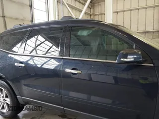 2015 Chevrolet Traverse LT with VIN 1GNKVGKDXFJ356467, listed as a IAAI auction lot 41954861 with 219,697 mi miles and . Bid and sale history available at DreamBid. Image 13.