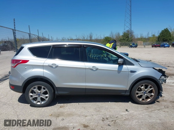 2013 Ford Escape SEL z VIN 1FMCU9H93DUA34811, wystawiony jako IAAI lot #42227559 z przebiegiem 126 495 mil mil oraz . Historia ofert i sprzedaży dostępna na DreamBid. Obrazek 14.