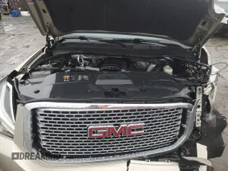2015 GMC Yukon Denali with VIN 1GKS2CKJ3FR592707, listed as a Copart auction lot 47581575 with 121,326 mi miles and Salvage Title. Bid and sale history available at carsss.com. Image 12.