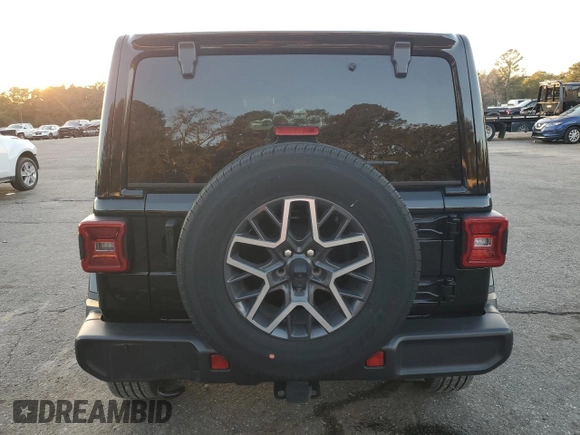2024 Jeep Wrangler Sahara with VIN 1C4PJXENXRW118401, listed as a Copart auction lot 84731534 with 6,895 mi miles and Salvage Title. Bid and sale history available at DreamBid. Image 6.