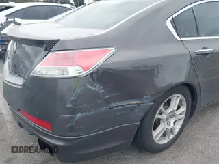 2009 Acura TL Technology z VIN 19UUA86519A014157, wystawiony jako IAAI lot #42058423 z przebiegiem 201 403 mil mil oraz . Historia ofert i sprzedaży dostępna na DreamBid. Obrazek 12.