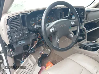 2005 GMC Yukon SLE z VIN 1GKEC13T25J140176, wystawiony jako IAAI lot #42267014 z przebiegiem Nie podano mil oraz . Historia ofert i sprzedaży dostępna na DreamBid. Obrazek 12.