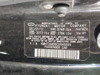 2012 Hyundai Veloster w/Gray Int with VIN KMHTC6AD6CU046899, listed as a IAAI auction lot 41804550 with 105,686 mi miles. Bid and sale history available at carsss.com. Image 9.