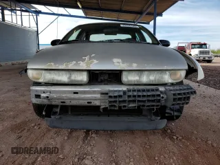 1998 Saturn SL z VIN 1G8ZK5276WZ213784, wystawiony jako Copart lot #49206105 z przebiegiem 160 280 mil mil oraz Szkody całkowita. Historia ofert i sprzedaży dostępna na DreamBid. Obrazek 5.