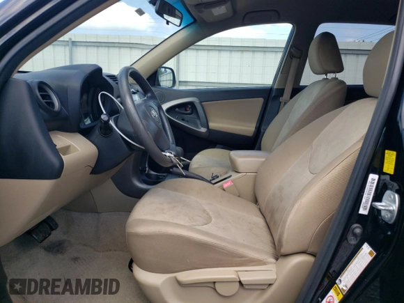 2010 Toyota RAV4 with VIN JTMZF4DV9AD025010, listed as a Copart auction lot 61625055 with 173,213 mi miles and Salvage title. Bid and sale history available at DreamBid. Image 7.