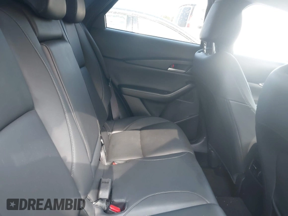 2024 Mazda CX-30 S Select Sport z VIN 3MVDMBBM1RM634542, wystawiony jako IAAI lot #42204673 z przebiegiem 24 694 mil mil oraz . Historia ofert i sprzedaży dostępna na DreamBid. Obrazek 8.