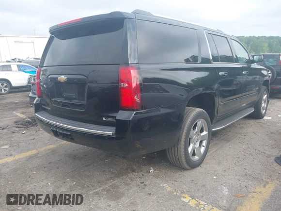 2018 Chevrolet Suburban Premier with VIN 1GNSCJKC9JR100504, listed as a IAAI auction lot 42276280 with 153,916 mi miles and . Bid and sale history available at DreamBid. Image 4.