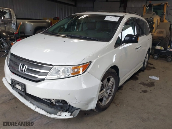 2012 Honda Odyssey Touring with VIN 5FNRL5H96CB134466, listed as a IAAI auction lot 41895655 with 127,672 mi miles. Bid and sale history available at carsss.com. Image 20.