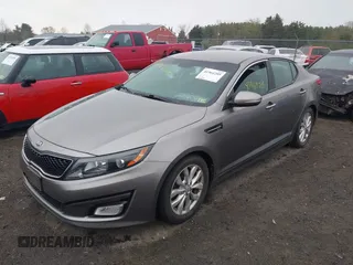 2015 Kia Optima LX with VIN 5XXGM4A76FG475908, listed as a IAAI auction lot 41964205 with 122,965 mi miles. Bid and sale history available at carsss.com. Image 2.