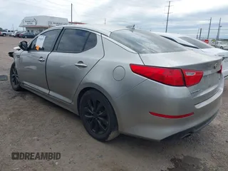 2015 Kia Optima LX with VIN 5XXGM4A70FG443696, listed as a IAAI auction lot 41962823 with 191,533 mi miles. Bid and sale history available at carsss.com. Image 3.