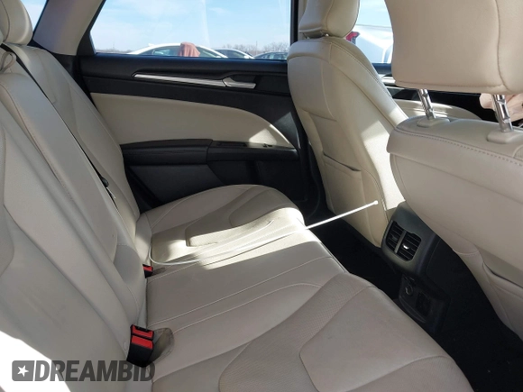 2017 Ford Fusion Hybrid Titanium z VIN 3FA6P0RU0HR314681, wystawiony jako IAAI lot #41288256 z przebiegiem 174 027 mil mil oraz . Historia ofert i sprzedaży dostępna na DreamBid. Obrazek 8.