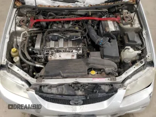 2002 Mazda Protege z VIN JM1BJ245X21565456, wystawiony jako Copart lot #43756385 z przebiegiem 195 892 mil mil oraz Szkoda całkowita • Salvage title. Historia ofert i sprzedaży dostępna na DreamBid. Obrazek 11.