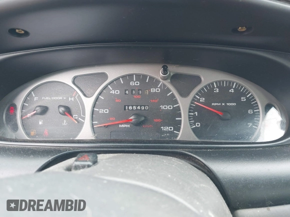 1999 Mercury Sable LS z VIN 1MEFM53S5XA647862, wystawiony jako IAAI lot #41762714 z przebiegiem 165 490 mil mil oraz . Historia ofert i sprzedaży dostępna na DreamBid. Obrazek 7.