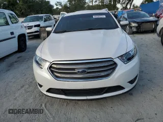 2019 Ford Taurus SEL with VIN 1FAHP2E82KG114879, listed as a Copart auction lot 80266574 with 75,561 mi miles and Salvage Title. Bid and sale history available at DreamBid. Image 5.