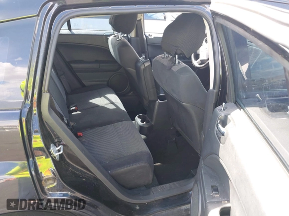 2010 Dodge Caliber SXT with VIN 1B3CB4HAXAD651644, listed as a IAAI auction lot 42173361 with 195,480 mi miles and . Bid and sale history available at DreamBid. Image 8.