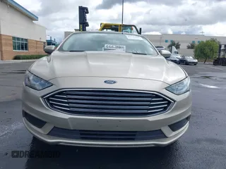 2017 Ford Fusion Hybrid SE with VIN 3FA6P0LU0HR355269, listed as a IAAI auction lot 41745299 with 97,675 mi miles and . Bid and sale history available at DreamBid. Image 12.