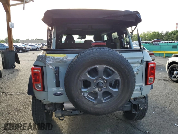 2022 Ford Bronco с VIN 1FMDE5BH0NLB40473, выставлен на аукционе Copart как лот 62125645 с пробегом 38 571 миль миль и Списание • Salvage title. История ставок и продаж доступна на DreamBid. Изображение 6.