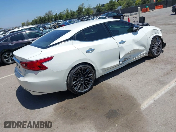 2016 Nissan Maxima SV with VIN 1N4AA6AP6GC903638, listed as a IAAI auction lot 42180421 with 124,586 mi miles and . Bid and sale history available at DreamBid. Image 4.