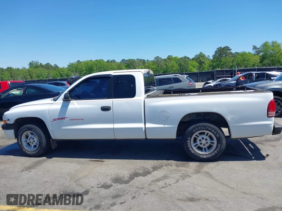 1999 Dodge Dakota SLT z VIN 1B7GL22X0XS193423, wystawiony jako IAAI lot #42053562 z przebiegiem 209 802 mil mil oraz . Historia ofert i sprzedaży dostępna na DreamBid. Obrazek 14.