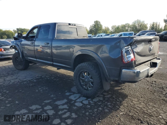 2020 Ram 3500 Laramie with VIN 3C63R3JL3LG240972, listed as a Copart auction lot 77382524 with 99,918 mi miles and Salvage Title. Bid and sale history available at carsss.com. Image 2.