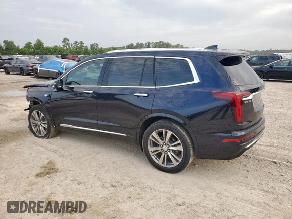 2022 Cadillac XT6 Premium Luxury with VIN 1GYKPCRS1NZ152828, listed as a Copart auction lot 64646525 with 18,913 mi miles and Salvage title. Bid and sale history available at DreamBid. Image 2.