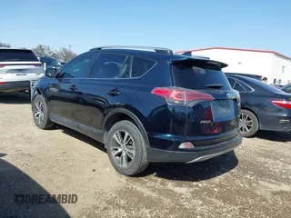 2018 Toyota RAV4 XLE with VIN JTMWFREV7JJ186925, listed as a IAAI auction lot 41717611 with 79,580 mi miles. Bid and sale history available at carsss.com. Image 14.