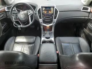 2016 Cadillac SRX Luxury Collection with VIN 3GYFNBE39GS526005, listed as a Copart auction lot 61870615 with 188,017 mi miles and Salvage title. Bid and sale history available at DreamBid. Image 8.