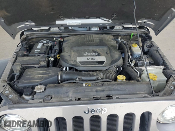 2017 Jeep Wrangler Unlimited Rubicon with VIN 1C4BJWFG4HL677477, listed as a Copart auction lot 57758175 with 89,584 mi miles and Salvage title. Bid and sale history available at DreamBid. Image 11.