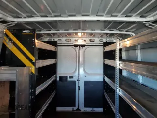 2023 Ram ProMaster Cargo with VIN 3C6LRVVG5PE527224, listed as a Copart auction lot 77179234 with 33,804 mi miles and Salvage Title. Bid and sale history available at DreamBid. Image 10.