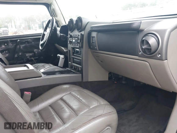 2003 Hummer H2 with VIN 5GRGN23U73H142389, listed as a IAAI auction lot 42219627 with 78,547 mi miles. Bid and sale history available at carsss.com. Image 5.