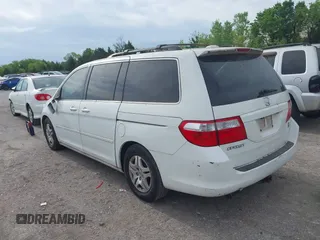 2007 Honda Odyssey EX-L with VIN 5FNRL38787B051582, listed as a IAAI auction lot 42104718 with 193,630 mi miles and . Bid and sale history available at DreamBid. Image 3.