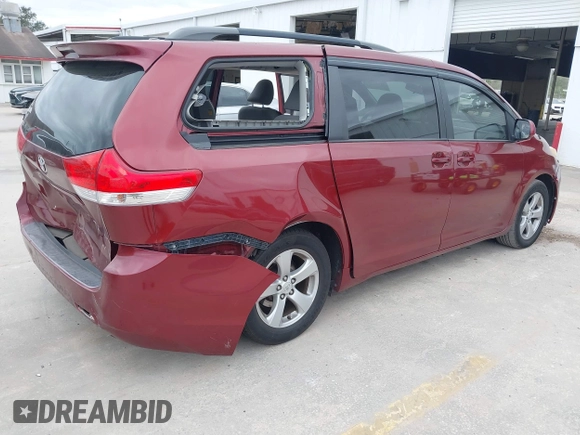 2011 Toyota Sienna LE AAS with VIN 5TDKK3DC8BS014320, listed as a IAAI auction lot 41587522 with 89,185 mi miles. Bid and sale history available at carsss.com. Image 4.