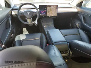 2021 Tesla Model 3 Standard Range Plus with VIN 5YJ3E1EA4MF849187, listed as a Copart auction lot 51689605 with 77,266 mi miles and Salvage Title. Bid and sale history available at carsss.com. Image 8.