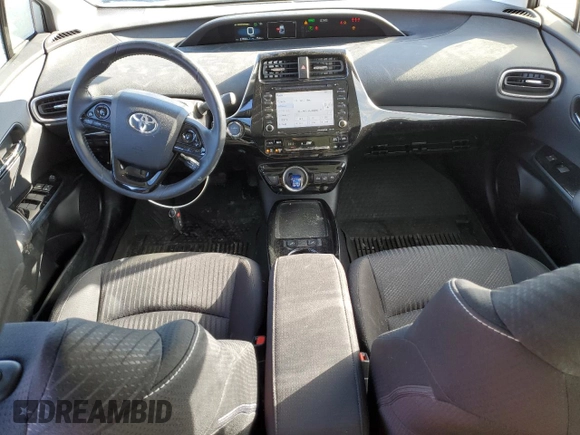 2021 Toyota Prius LE with VIN JTDKAMFP5M3193929, listed as a Copart auction lot 42902175 with 27,933 mi miles and Salvage Title. Bid and sale history available at DreamBid. Image 8.