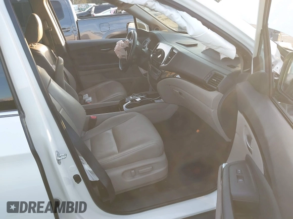 2019 Honda Pilot Touring 8-Passenger with VIN 5FNYF5H97KB005203, listed as a IAAI auction lot 41399930 with 47,267 mi miles and . Bid and sale history available at DreamBid. Image 5.
