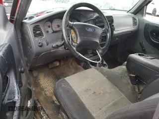 2003 Ford Ranger XL Fleet with VIN 1FTZR15E23PB82156, listed as a Copart auction lot 84161424 with 219,768 mi miles and Salvage Title. Bid and sale history available at DreamBid. Image 8.