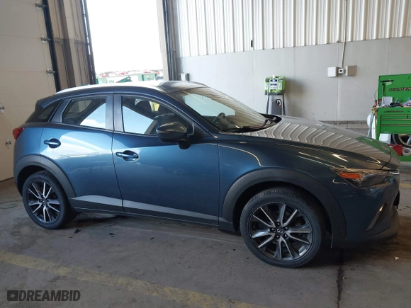 2018 Mazda CX-3 Touring with VIN JM1DKFC78J1323439, listed as a IAAI auction lot 41725784 with 134,055 mi miles. Bid and sale history available at carsss.com. Image 13.