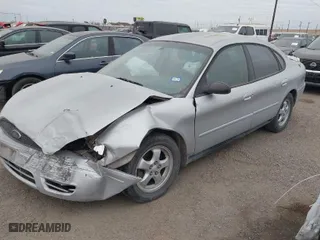 2005 Ford Taurus SE with VIN 1FAFP53265A148323, listed as a IAAI auction lot 41279566 with 1 miles. Bid and sale history available at carsss.com. Image 2.