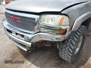 2003 GMC Sierra 1500HD SLT z VIN 1GTGK13U93F108499, wystawiony jako IAAI lot #42149012 z przebiegiem 296 775 mil mil oraz . Historia ofert i sprzedaży dostępna na DreamBid. Obrazek 6.