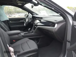 2024 Cadillac XT6 FWD Premium Luxury with VIN 1GYKPCRS0RZ748048, listed as a IAAI auction lot 42043117 with 7,232 mi miles. Bid and sale history available at carsss.com. Image 5.