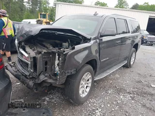 2015 GMC Yukon XL SLE z VIN 1GKS1GKC8FR507436, wystawiony jako IAAI lot #42113696 z przebiegiem Nie podano mil oraz . Historia ofert i sprzedaży dostępna na DreamBid. Obrazek 2.