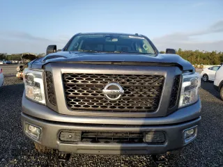 2019 Nissan Titan XD SV with VIN 1N6BA1F4XKN532266, listed as a Copart auction lot 77098244 with 105,965 mi miles and Salvage Title. Bid and sale history available at carsss.com. Image 5.