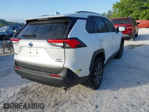 2024 Toyota RAV4 Hybrid XLE Premium with VIN 4T3B6RFV0RU151797, listed as a IAAI auction lot 42050155 with 9,659 mi miles. Bid and sale history available at carsss.com. Image 4.