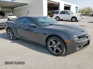 2013 Chevrolet Camaro LT with VIN 2G1FC1E31D9108870, listed as a Copart auction lot 61084435 with 142,670 mi miles and Salvage title. Bid and sale history available at DreamBid. Image 4.