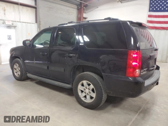 2012 GMC Yukon SLT with VIN 1GKS1CE04CR107539, listed as a Copart auction lot 49438295 with 232,526 mi miles and Salvage Title. Bid and sale history available at carsss.com. Image 2.
