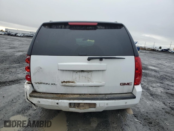 2013 GMC Yukon XL SLT z VIN 1GKS2KE74DR127036, wystawiony jako Copart lot #46916615 z przebiegiem 211 043 mil mil oraz Szkoda całkowita • Salvage title. Historia ofert i sprzedaży dostępna na DreamBid. Obrazek 6.