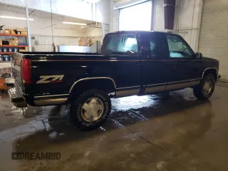 1997 Chevrolet Silverado 1500 with VIN 2GCEK19R4V1278872, listed as a Copart auction lot 51517895 with 250,814 mi miles and Salvage Title. Bid and sale history available at DreamBid. Image 3.