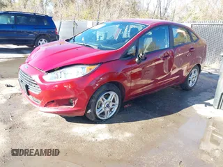 2017 Ford Fiesta SE z VIN 3FADP4BJ6HM143379, wystawiony jako IAAI lot #40863748 z przebiegiem 77 325 mil mil oraz . Historia ofert i sprzedaży dostępna na DreamBid. Obrazek 2.