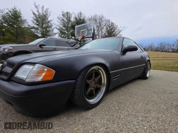 1999 Mercedes-Benz SL 500 with VIN WDBFA68FXXF184548, listed as a Copart auction lot 48104955 with 133,450 mi miles and Clean title. Bid and sale history available at DreamBid. Image 2.