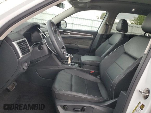 2023 Volkswagen Atlas SE z VIN 1V2KR2CA0PC529535, wystawiony jako Copart lot #55973775 z przebiegiem 23 476 mil mil oraz Czysty tytuł • Clean title. Historia ofert i sprzedaży dostępna na DreamBid. Obrazek 7.